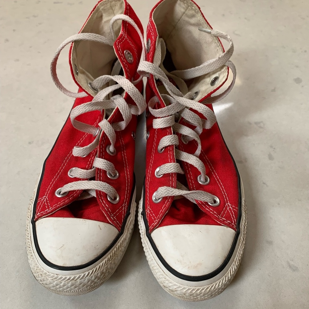 Red high-top Converse sneakers